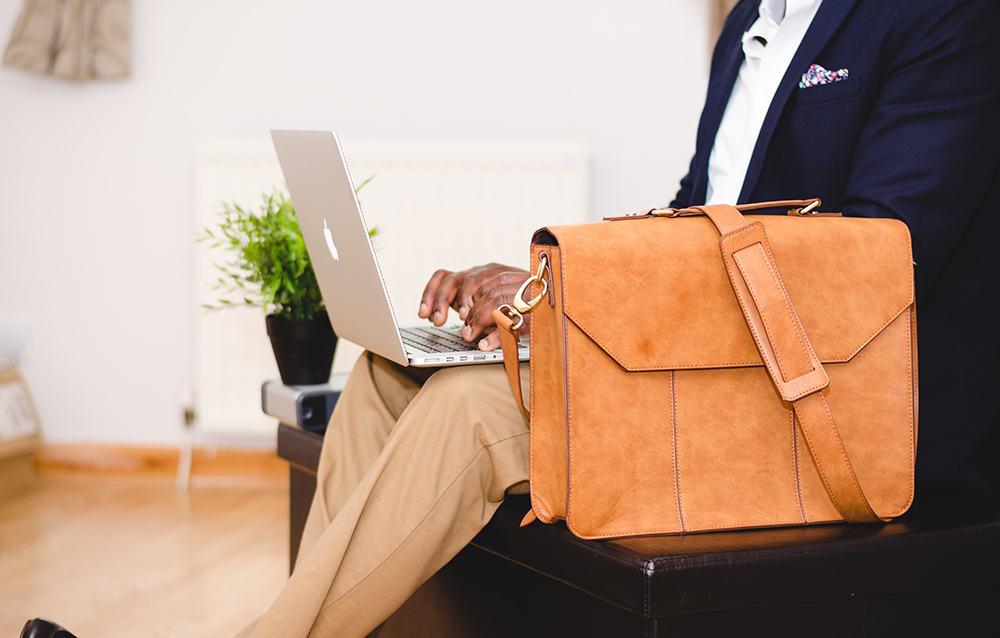 training-and-professional person with laptop and briefcase